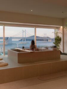 Hotel bathtub overlooking Gwangan Bridge in Busan, South Korea