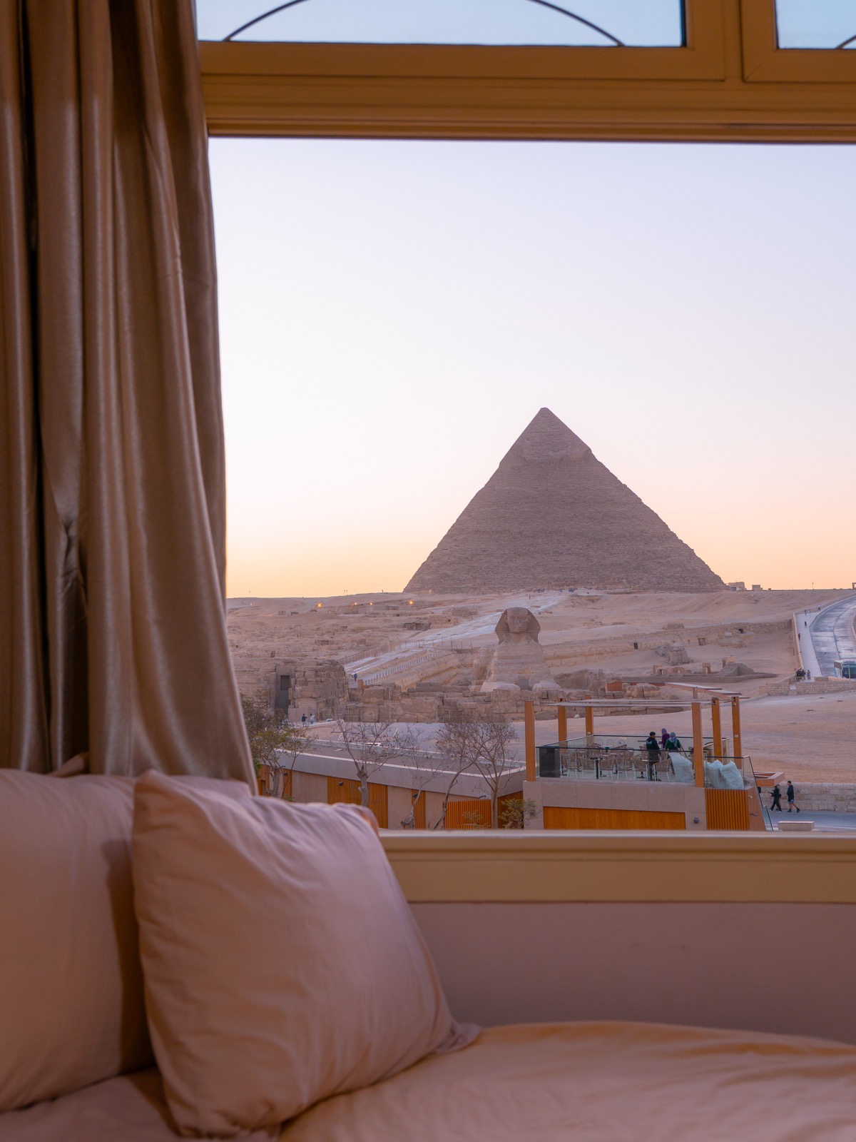 View of the Great Sphinx and Pyramid of Khafre from a Guardian Guest House room