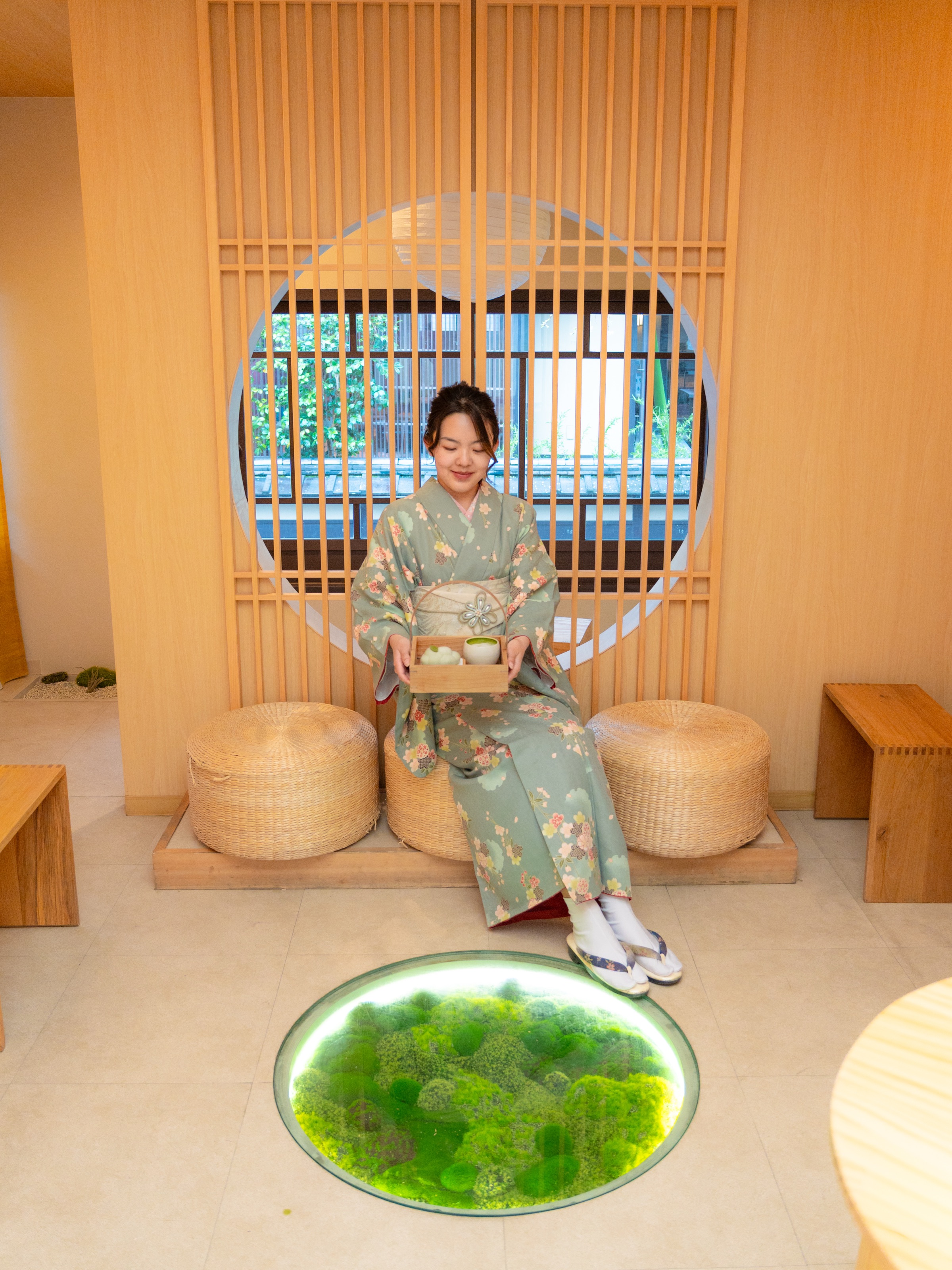 Woman in kimono at Kyoto cafe