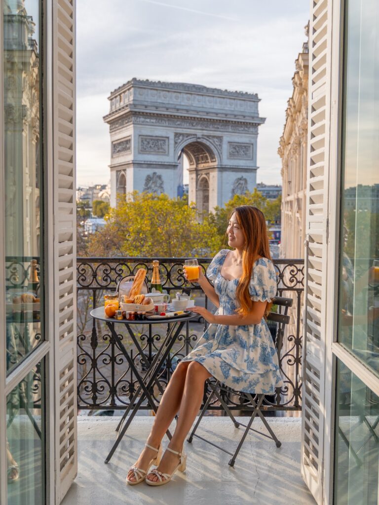 Breakfast on a Paris balcony with the Arc de Triomphe in the background